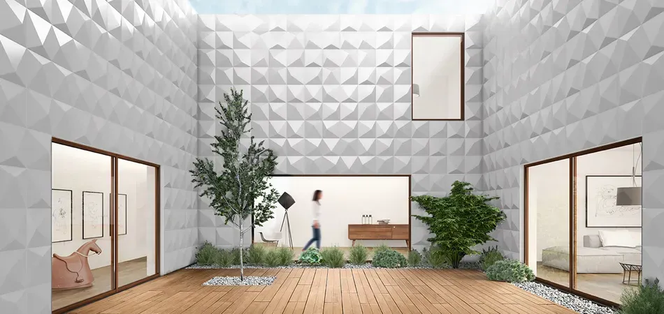 Progetto Esterno Prisma rivestimento cemento geometrico